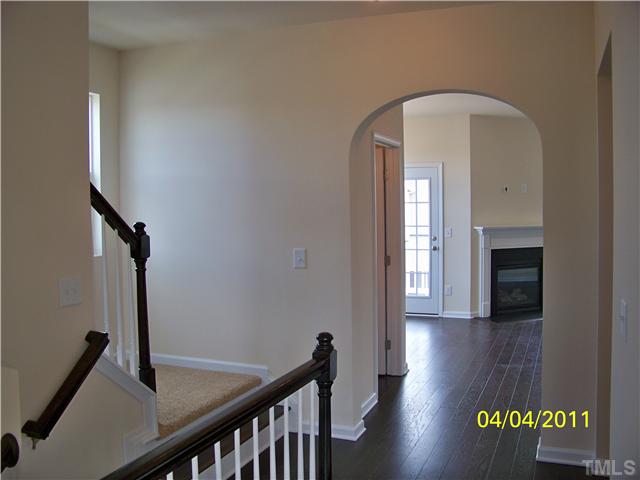 9142 Falkwood Road, Unit 171 Raleigh, NC 27617 - Photo 8 of 18 A beautiful arched doorway invites you to the open living area.