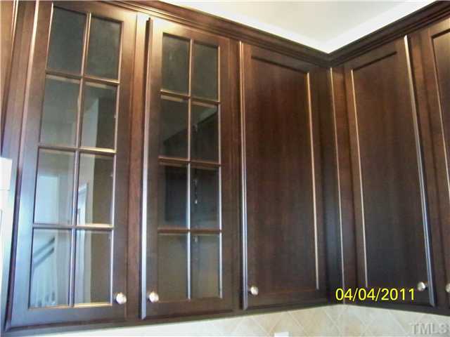 9142 Falkwood Road, Unit 171 Raleigh, NC 27617 - Photo 10 of 18 Plenty of gorgeous 42" Kona cabinets w/Glass Doors and a pantry for all of your kitchen storage needs!