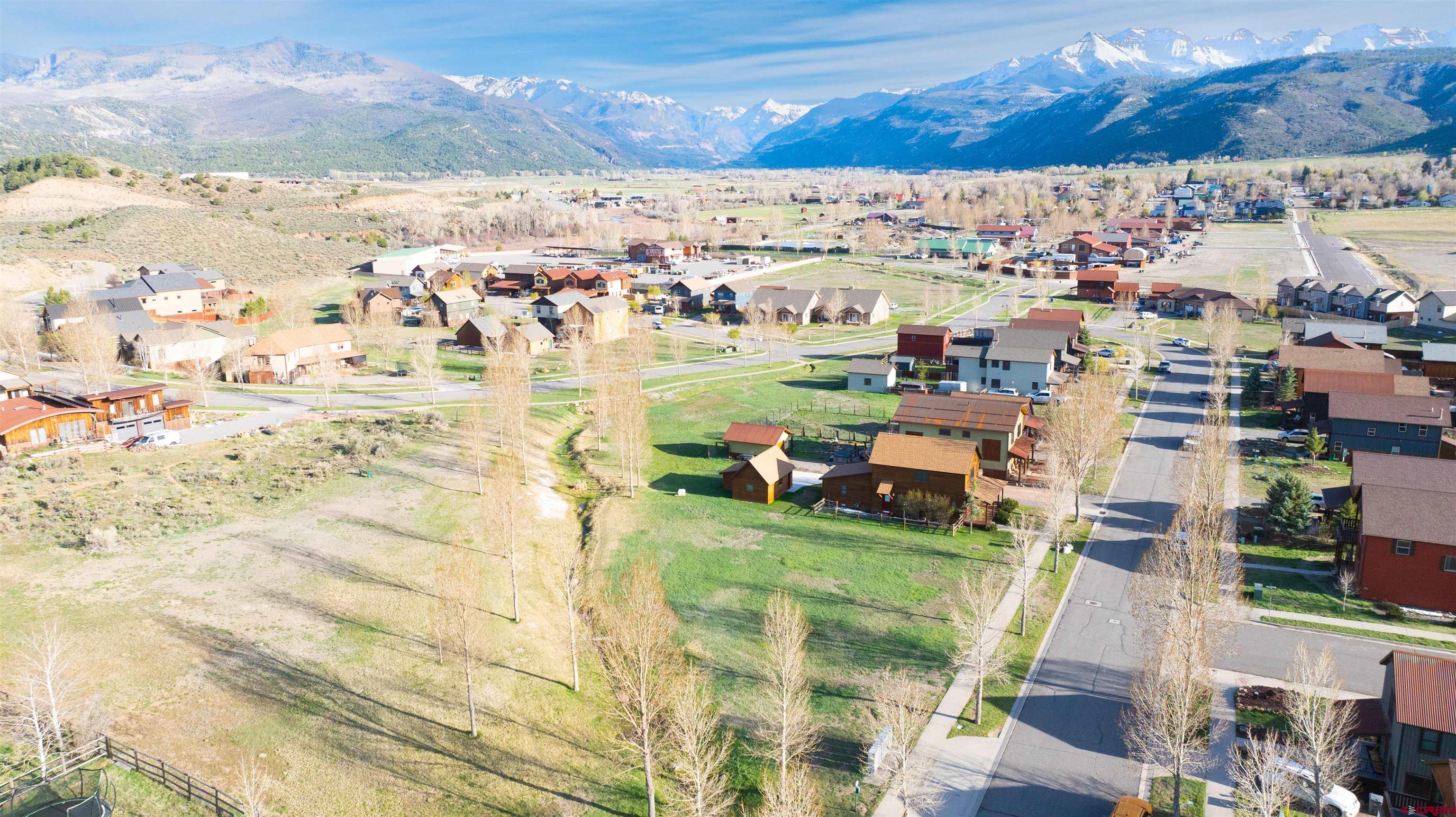470-480 Kismet Street Ridgway, CO 81432 - Photo 18 of 20 a view of a lake with a mountain