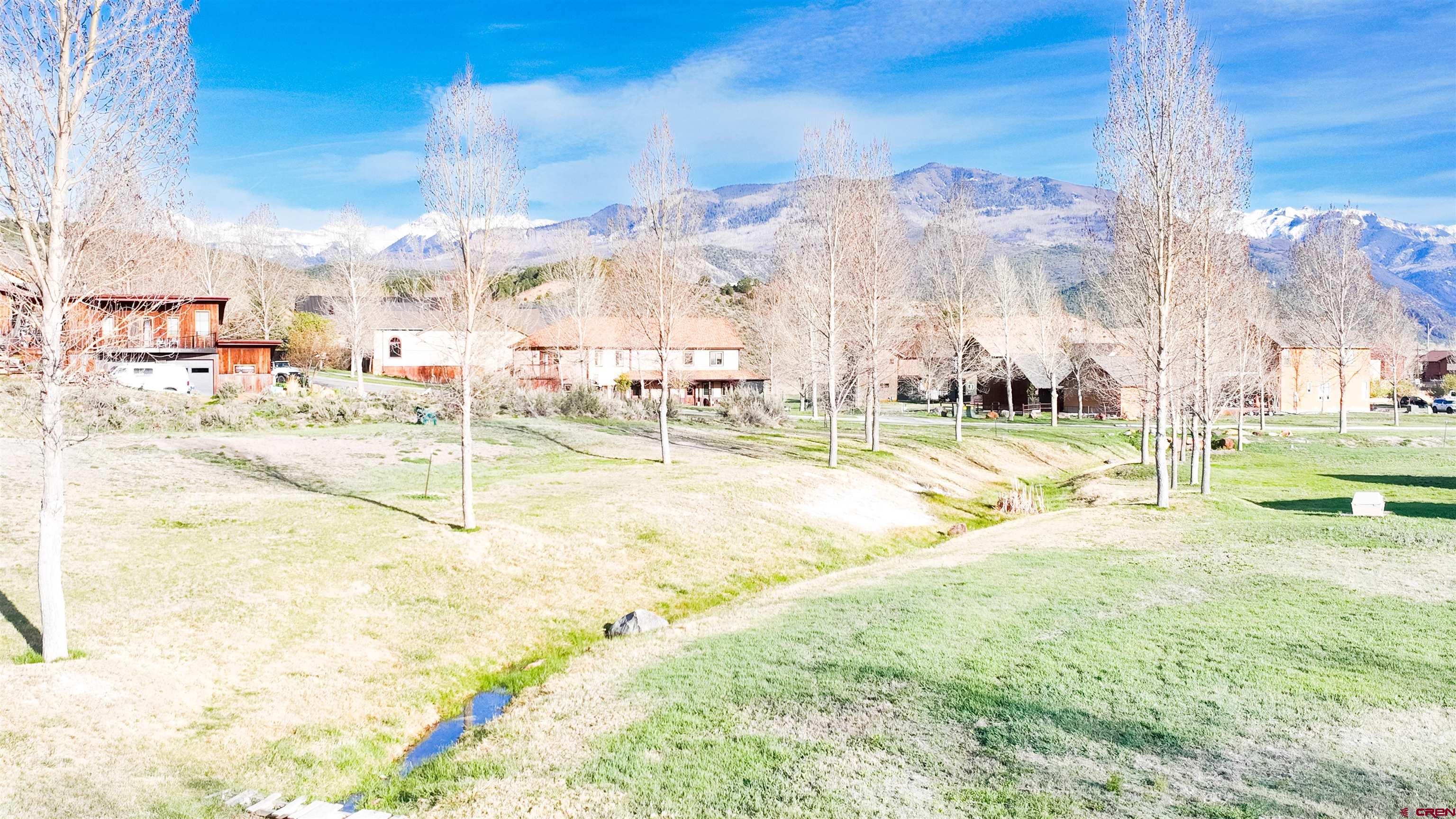 470-480 Kismet Street Ridgway, CO 81432 - Photo 5 of 20 a view of a swimming pool with a yard