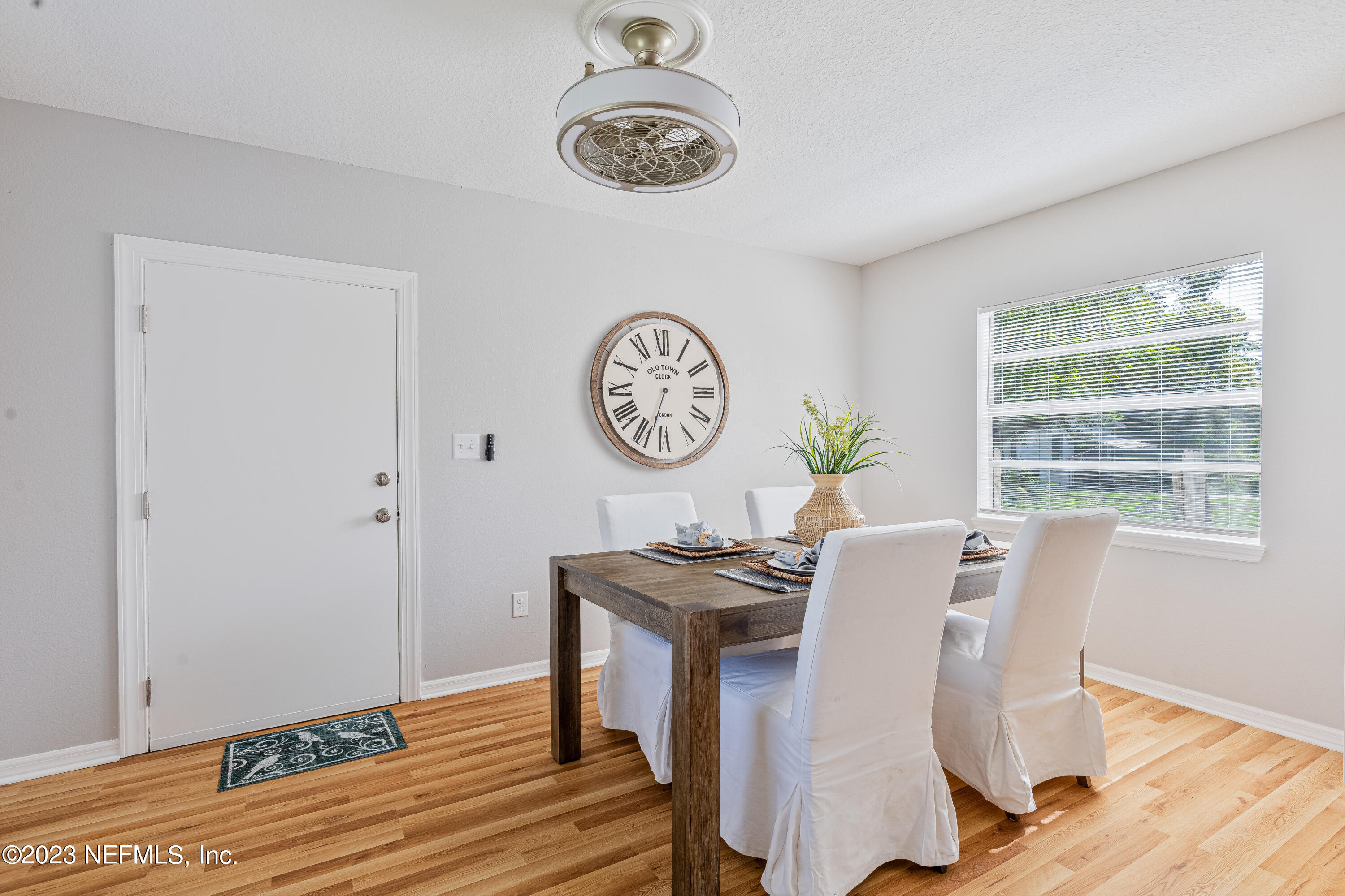 4729 Cambridge Road Jacksonville, FL 32210 - Photo 20 of 37 a view of a dining room with furniture and window