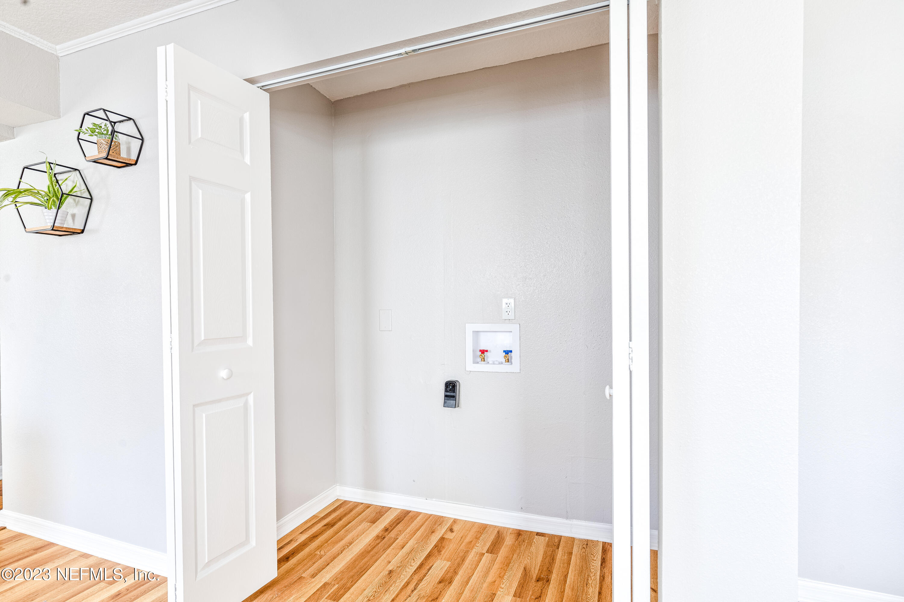 4729 Cambridge Road Jacksonville, FL 32210 - Photo 21 of 37 a view of an entryway with wooden floor