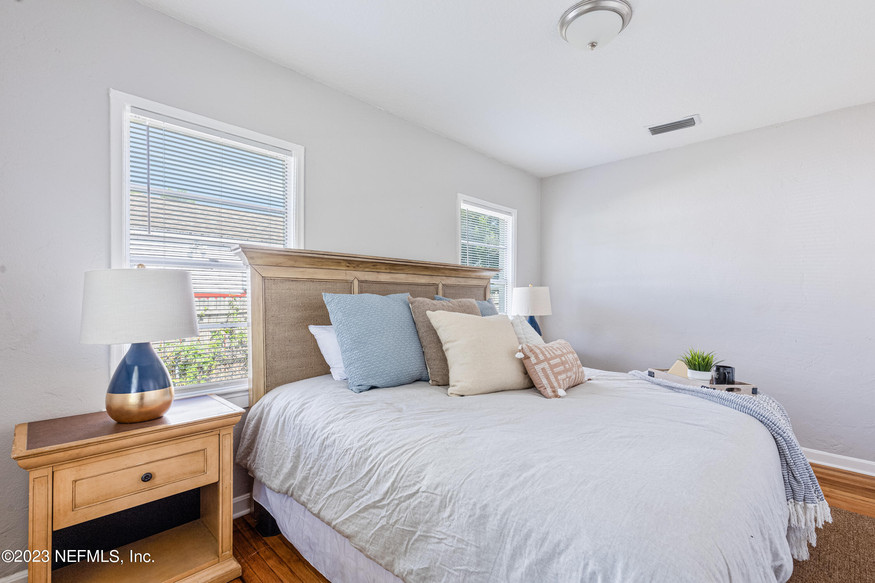 4729 Cambridge Road Jacksonville, FL 32210 - Photo 23 of 37 a bedroom with a bed and a window