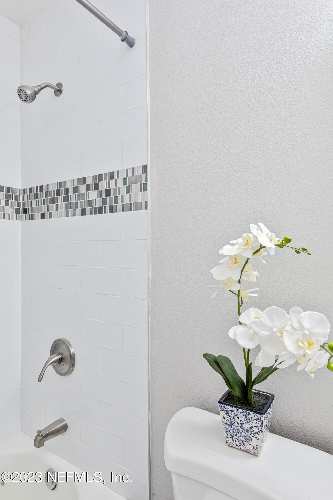 4729 Cambridge Road Jacksonville, FL 32210 - Photo 27 of 37 a view of a bathroom with a potted plant