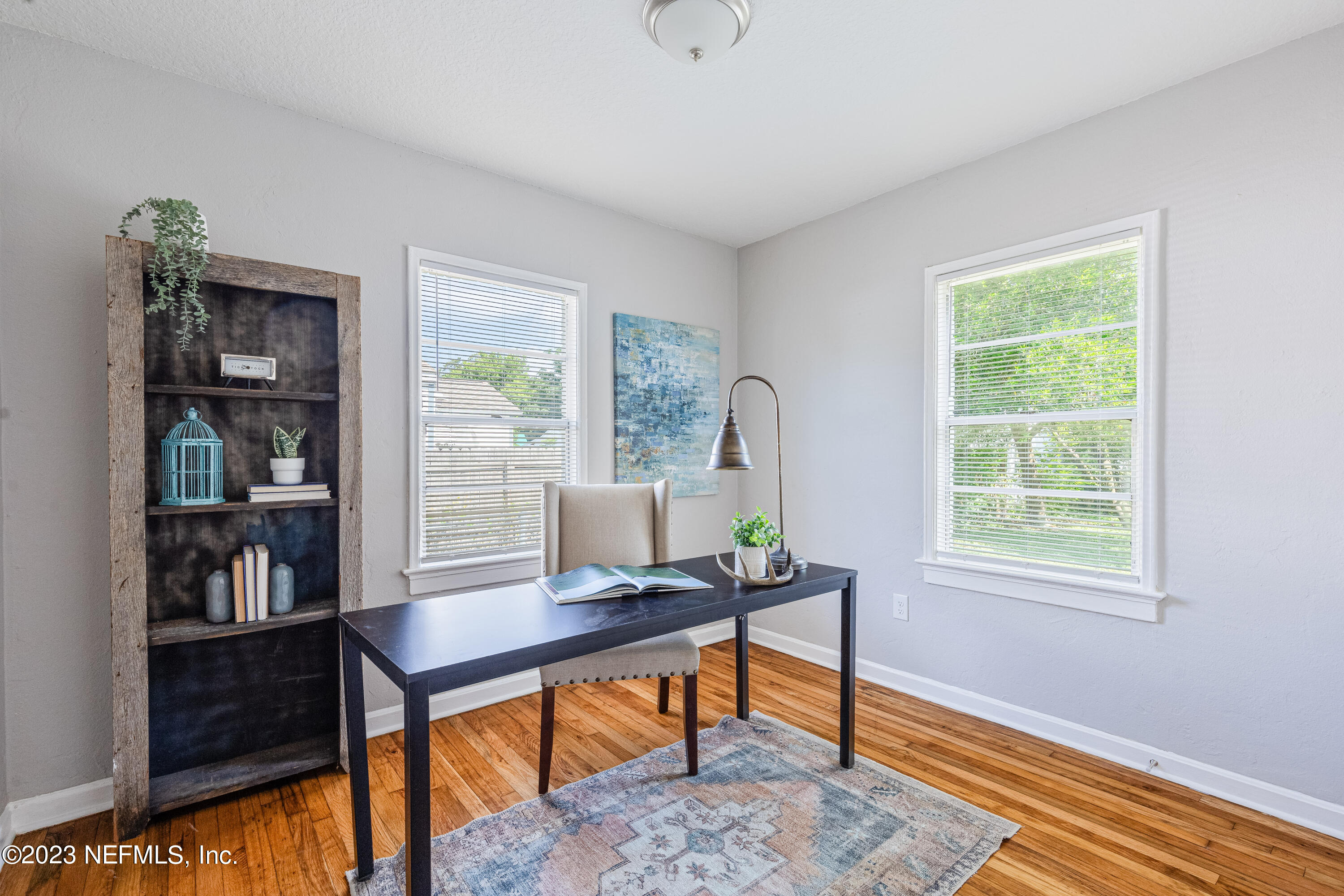 4729 Cambridge Road Jacksonville, FL 32210 - Photo 30 of 37 a view of a workspace with furniture and a window