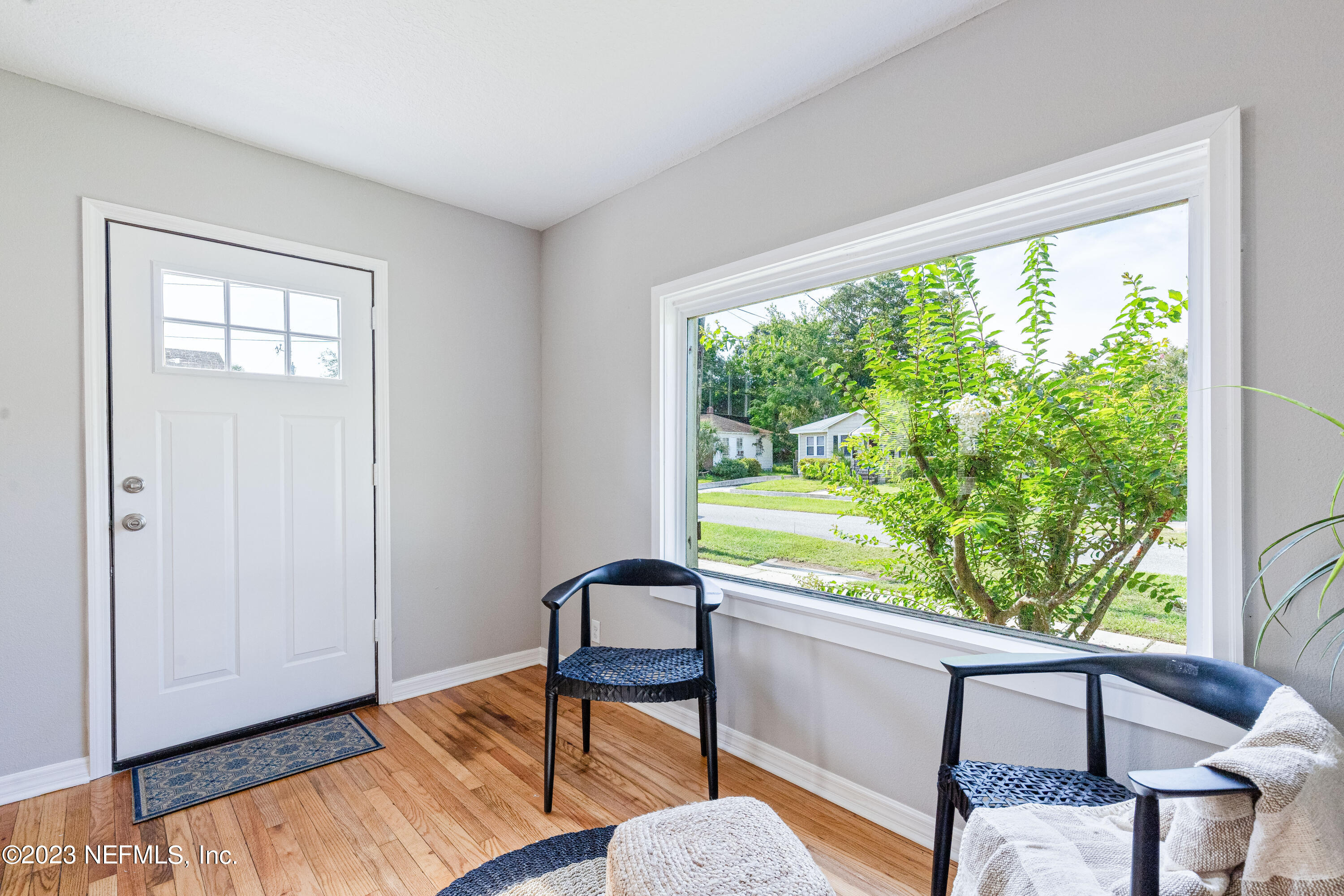 4729 Cambridge Road Jacksonville, FL 32210 - Photo 7 of 37 a view of a bedroom with furniture and a window