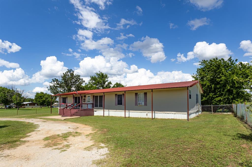 75 Southern Road Mineral Wells, TX 76067 - Photo 4 of 31 a view of house with outdoor space and swimming pool