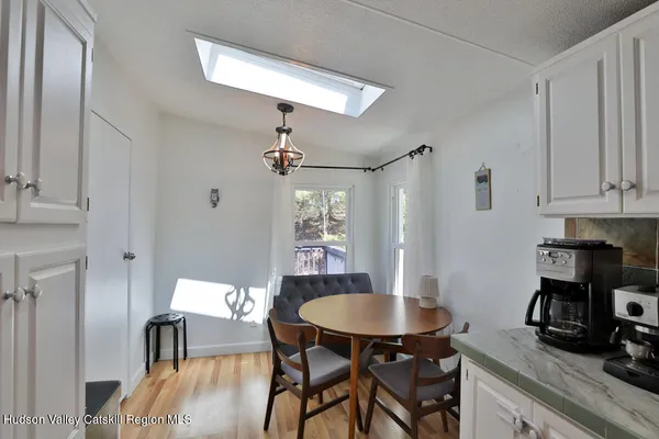 a view of a dining room with furniture