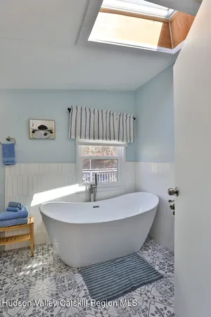 a view of a bathtub in a room