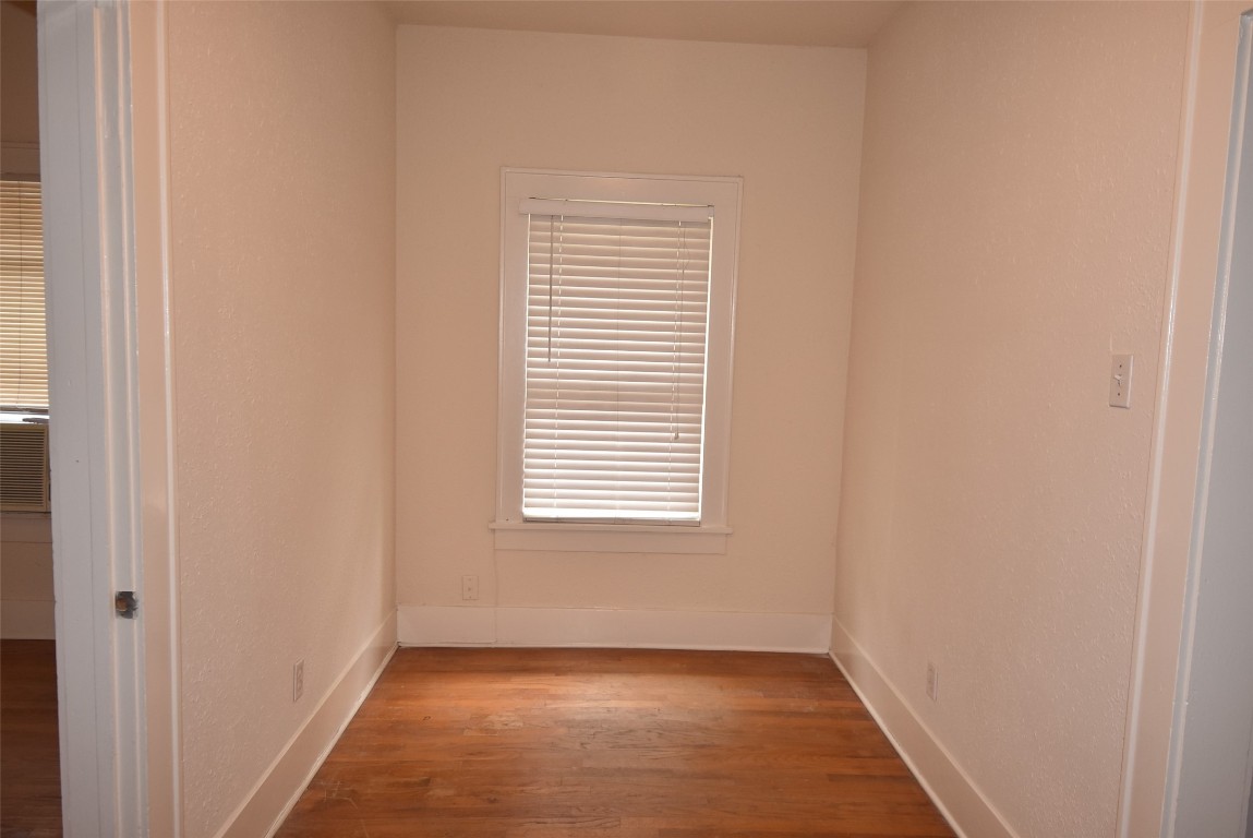 4618 Clay Street Houston, TX 77023 - Photo 12 of 20 a view of an empty room with a window