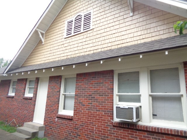 4618 Clay Street Houston, TX 77023 - Photo 5 of 20 a view of a house with large windows