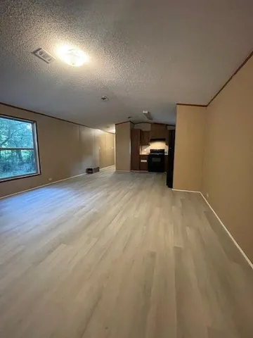 a view of a livingroom with a staircase