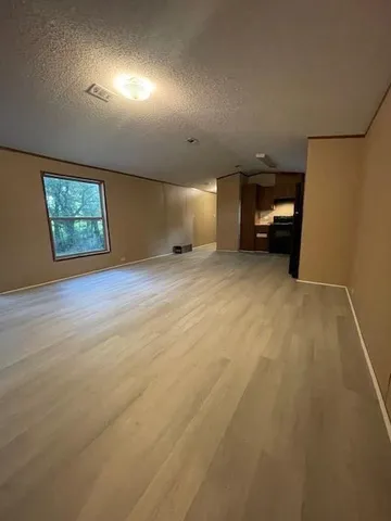 a view of a livingroom with furniture