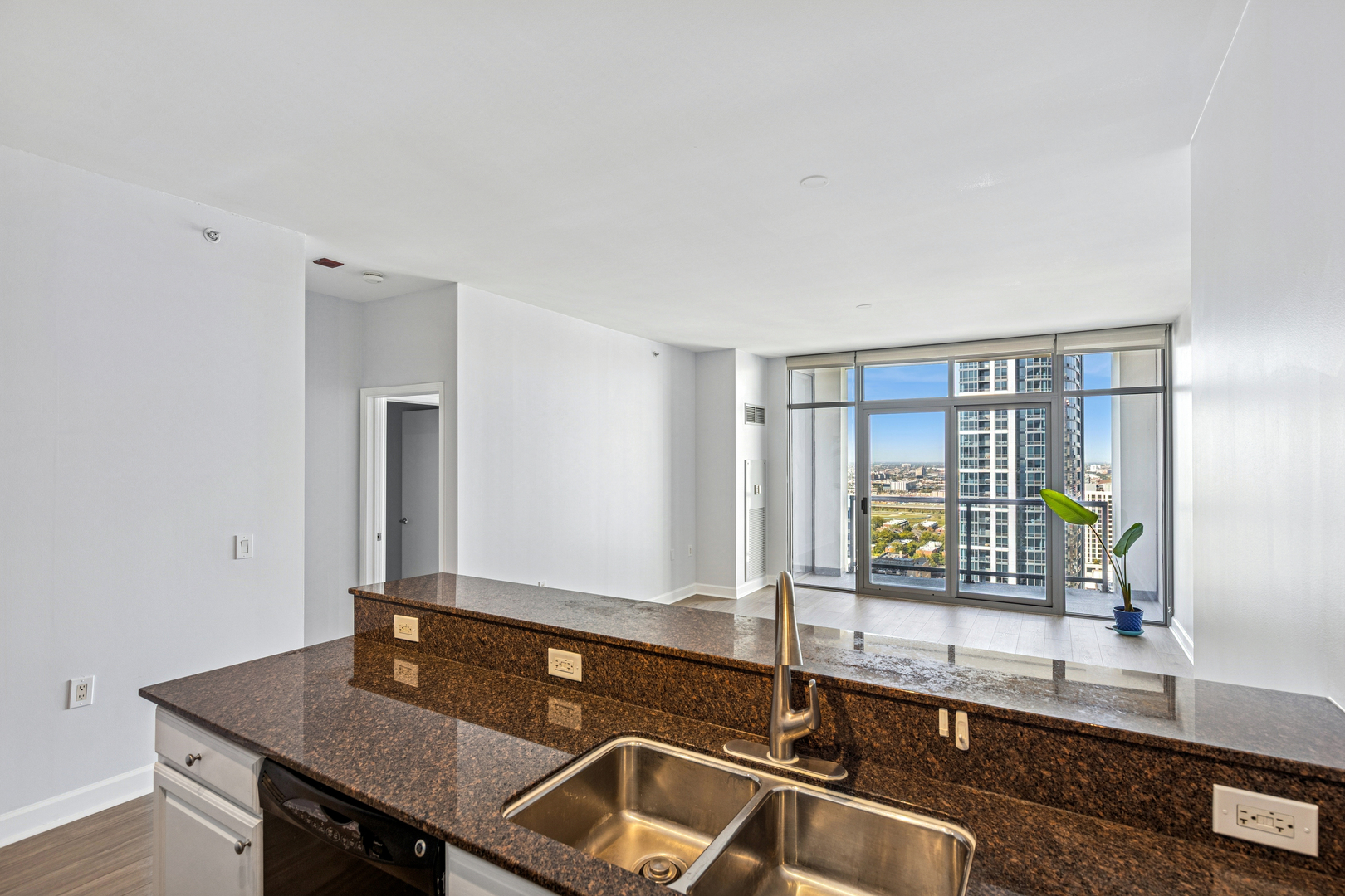 1235 South Prairie Avenue, Unit 2506 Chicago, IL 60605 - Photo 15 of 32 a room with a table chairs and wooden floor