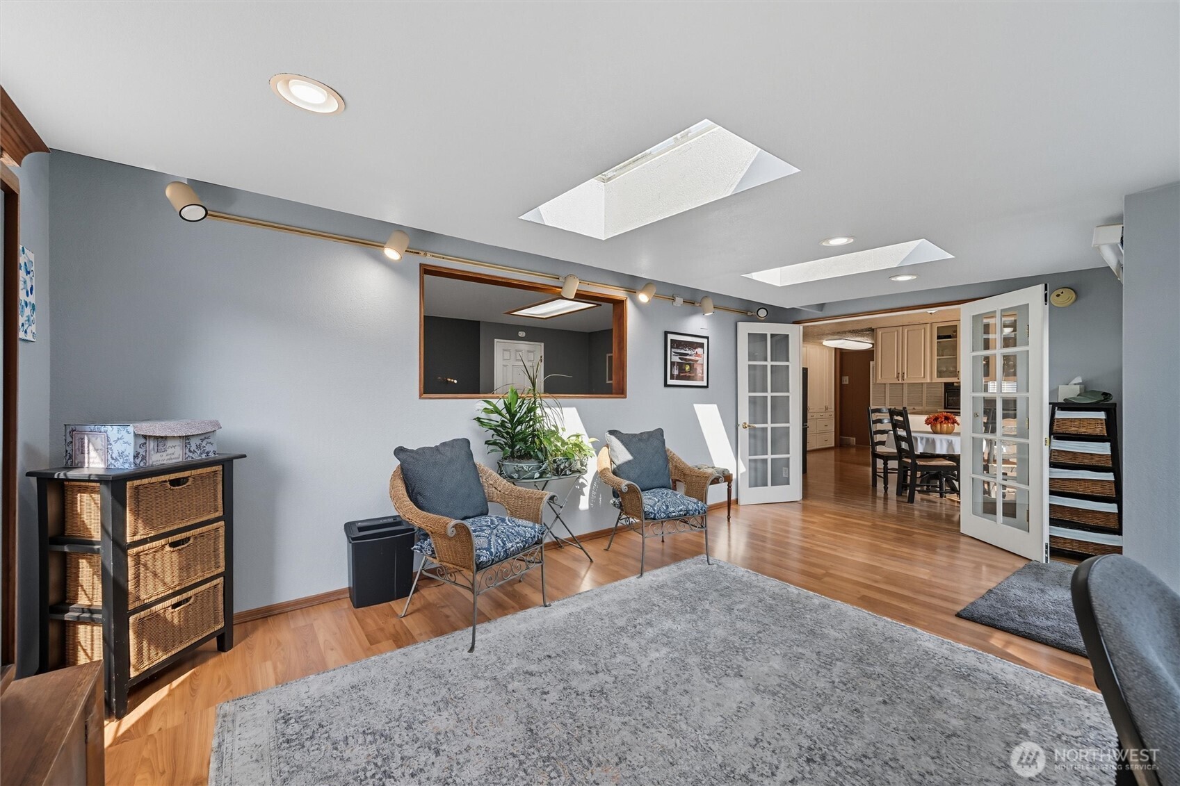 1125 Lattimore Road Ferndale, WA 98248 - Photo 15 of 39 a living room with furniture a dining table and chairs with wooden floor