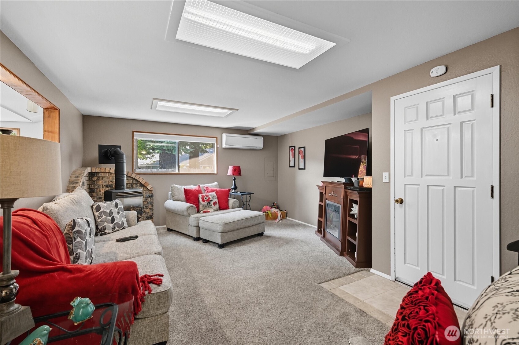 1125 Lattimore Road Ferndale, WA 98248 - Photo 16 of 39 a living room with furniture and a flat screen tv