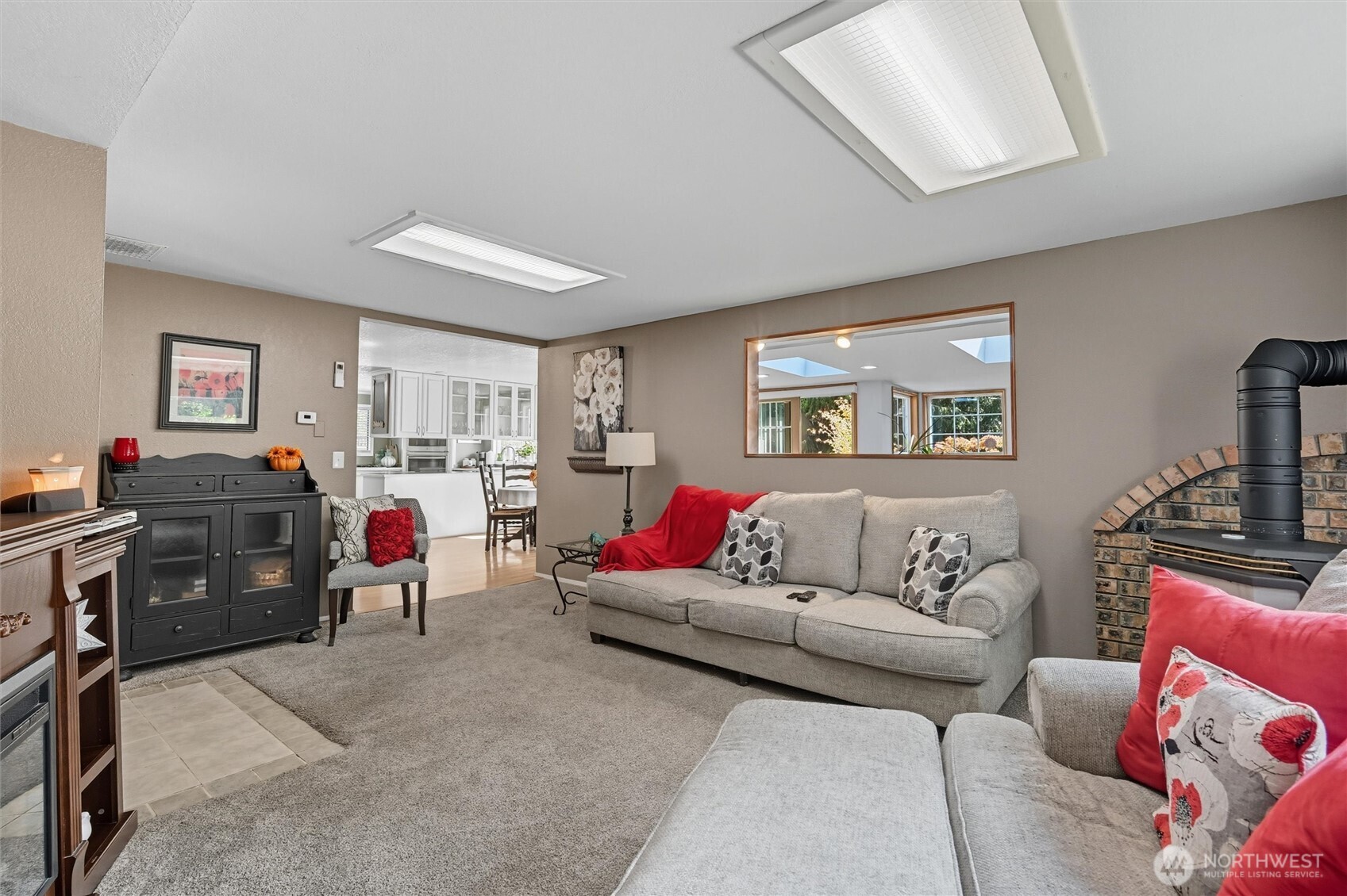 1125 Lattimore Road Ferndale, WA 98248 - Photo 17 of 39 a living room with furniture and a flat screen tv
