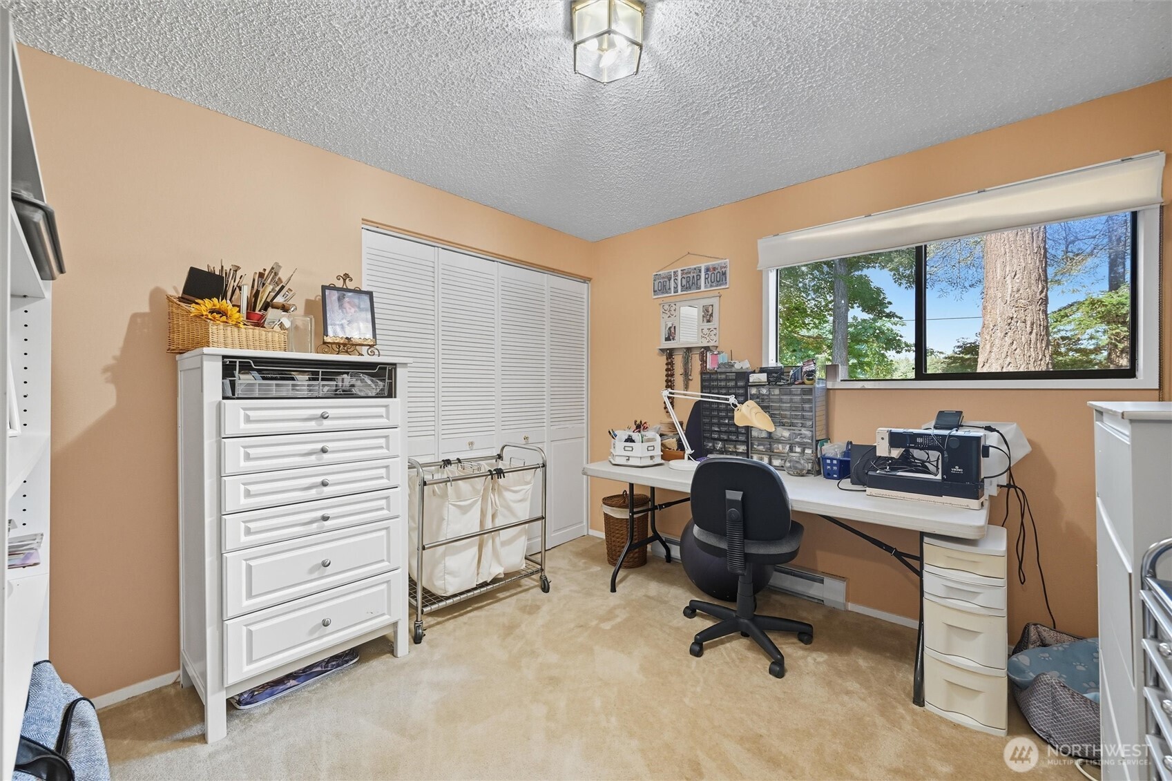 1125 Lattimore Road Ferndale, WA 98248 - Photo 19 of 39 a view of a workspace with furniture and a window
