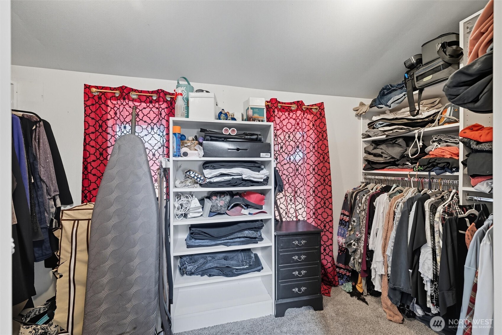 1125 Lattimore Road Ferndale, WA 98248 - Photo 24 of 39 a view of walk in closet with clothes and shoes