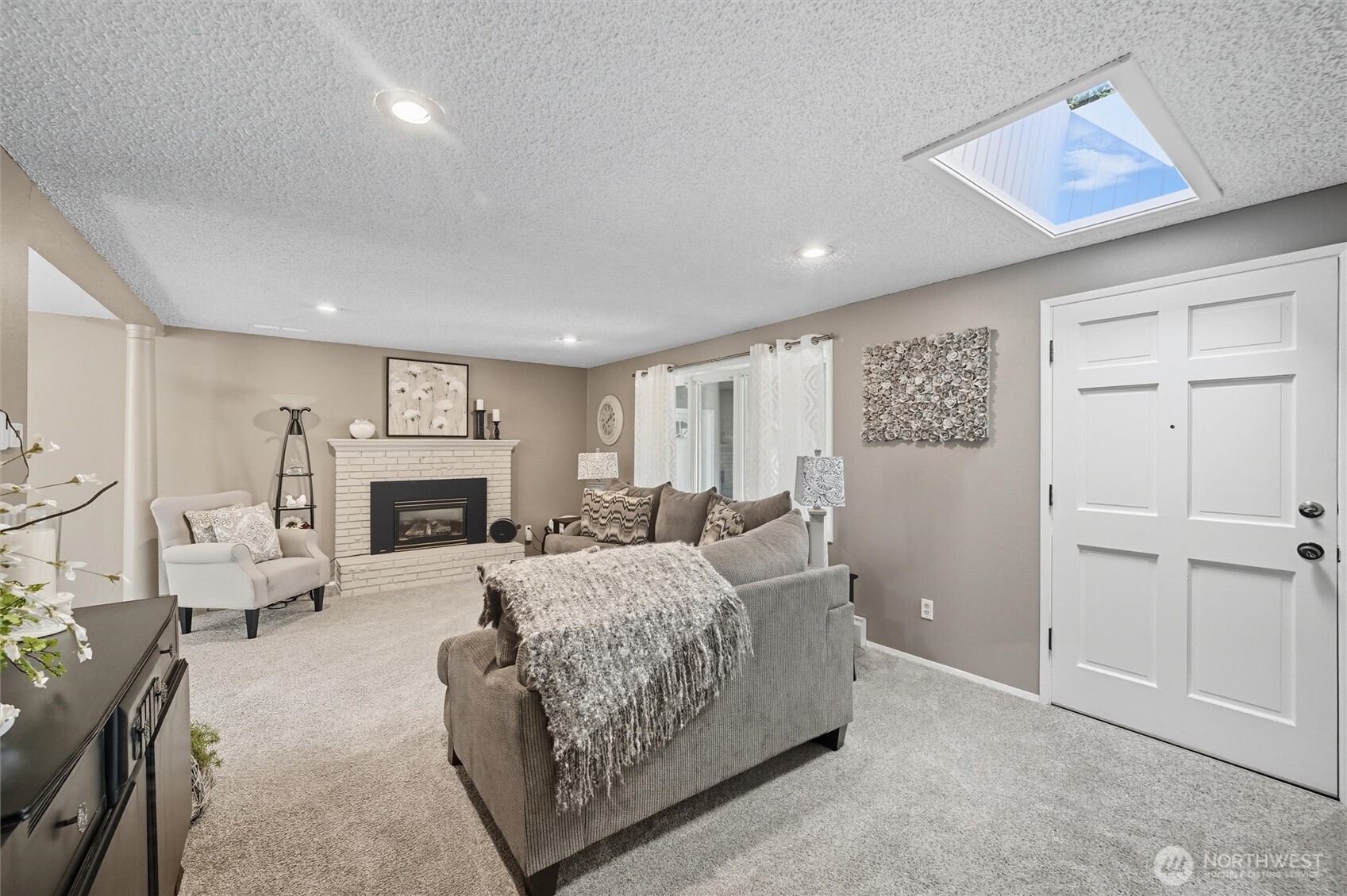 1125 Lattimore Road Ferndale, WA 98248 - Photo 5 of 39 a living room with furniture and a fireplace