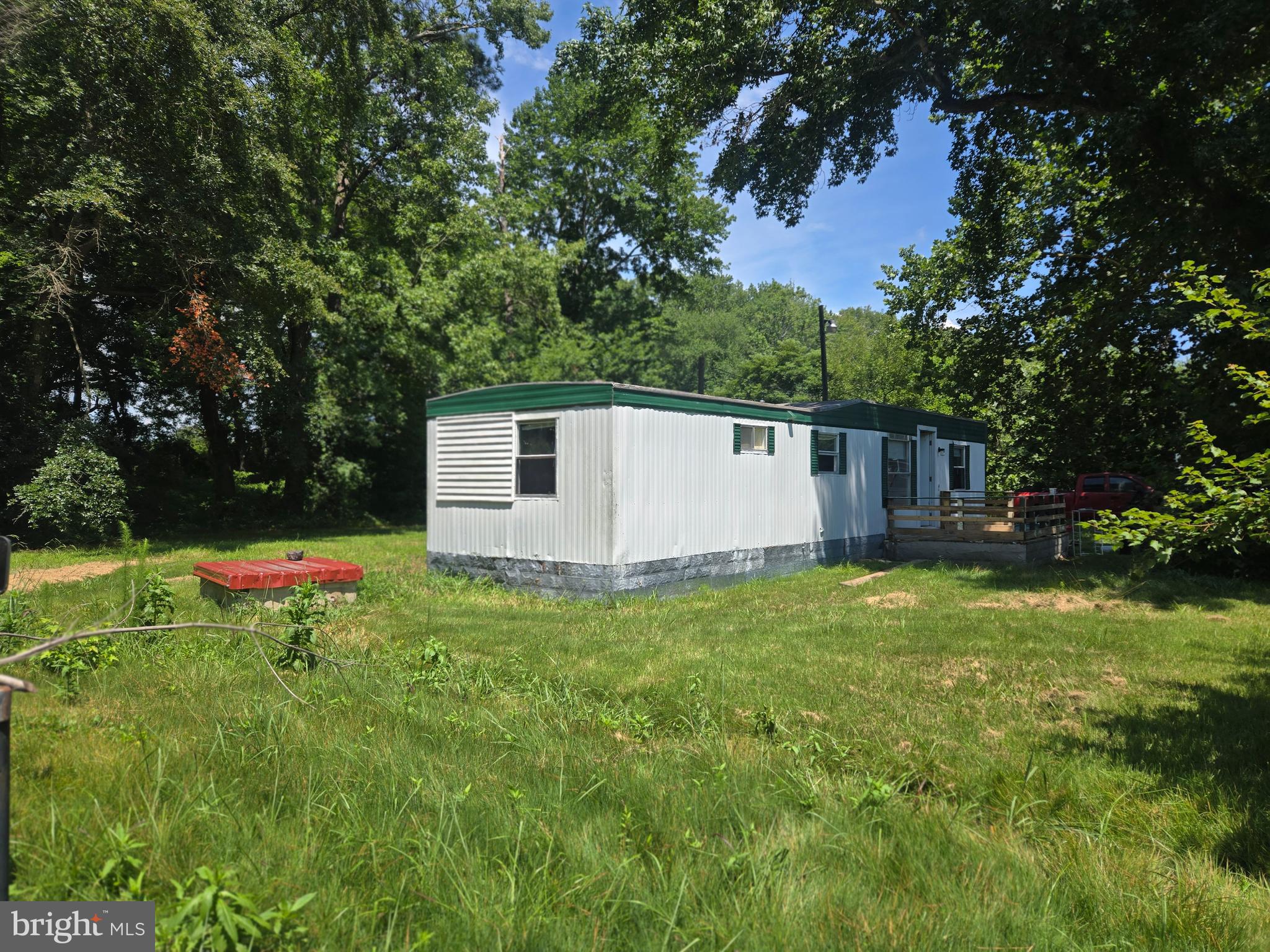 36676 Bi State Boulevard Delmar, DE 19940 - Photo 13 of 32 a backyard of a house with seating space