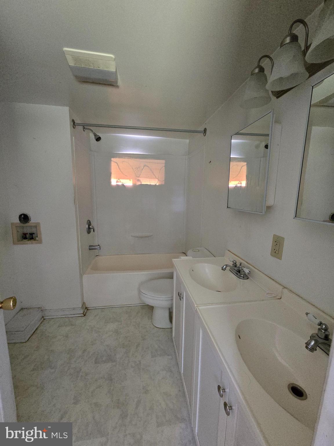 36676 Bi State Boulevard Delmar, DE 19940 - Photo 19 of 32 a bathroom with a sink a toilet and shower