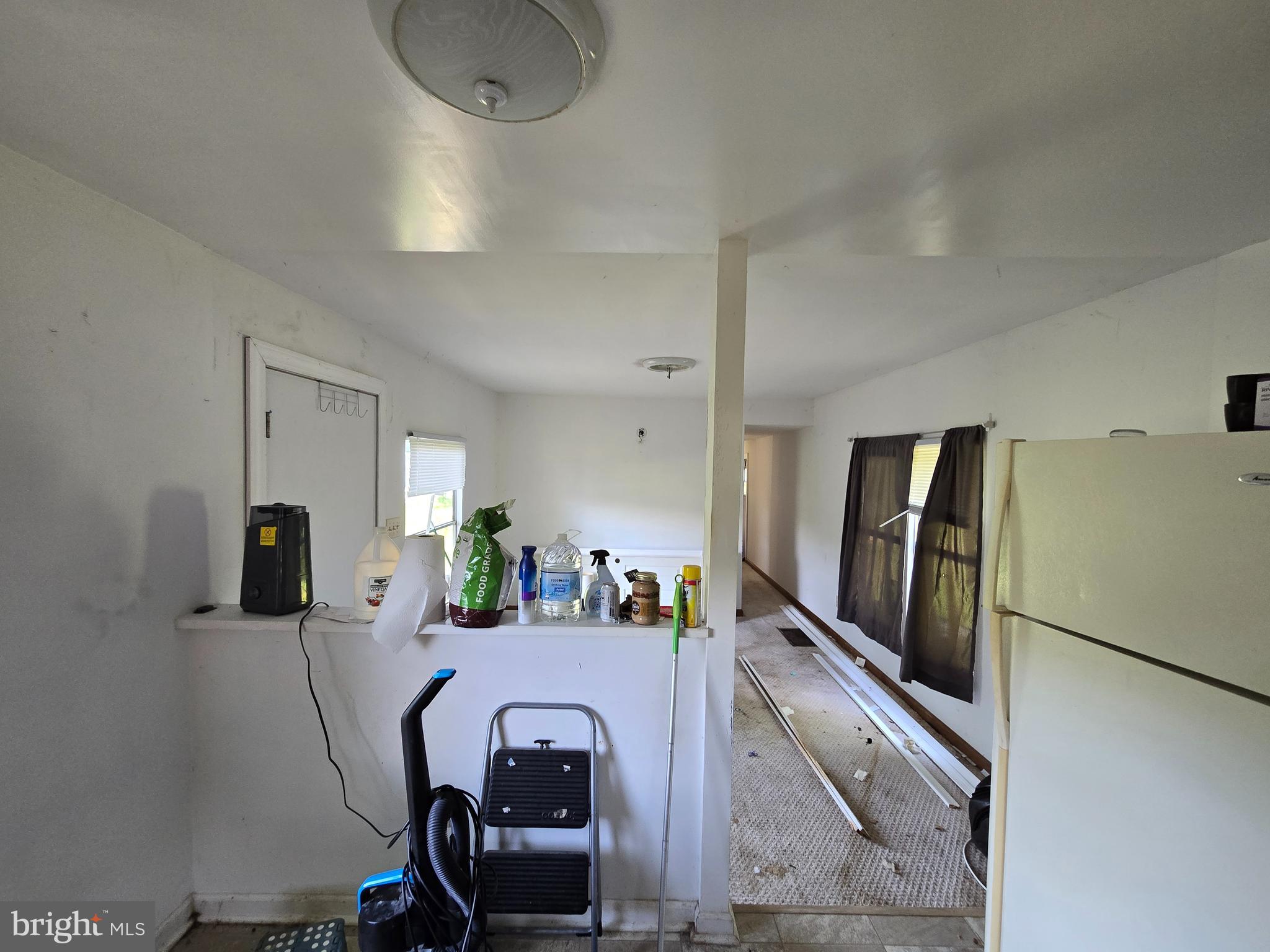 36676 Bi State Boulevard Delmar, DE 19940 - Photo 23 of 32 a dining room with furniture and a chandelier