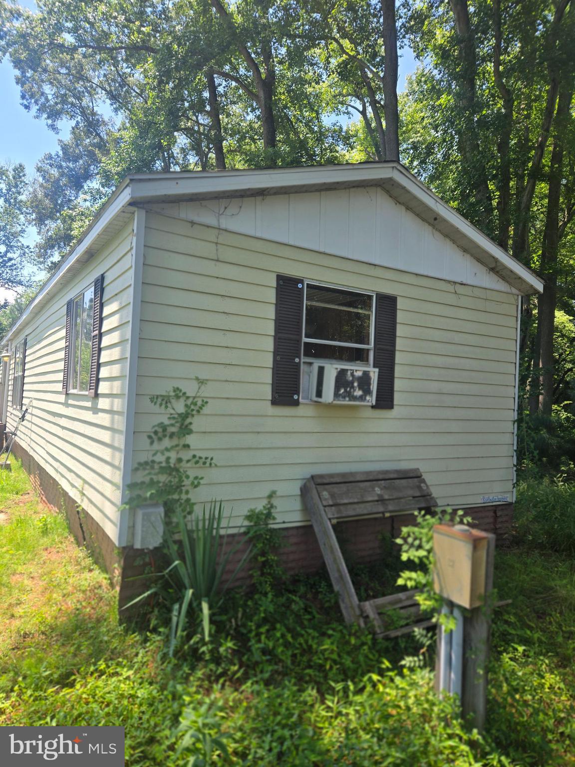 36676 Bi State Boulevard Delmar, DE 19940 - Photo 24 of 32 a backyard of a house with seating space