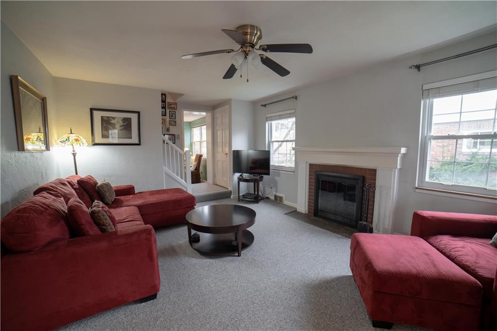 327 Beadling Road Pittsburgh, PA 15228 - Photo 3 of 13 Living room, wood burning fireplace open to family room addition.
