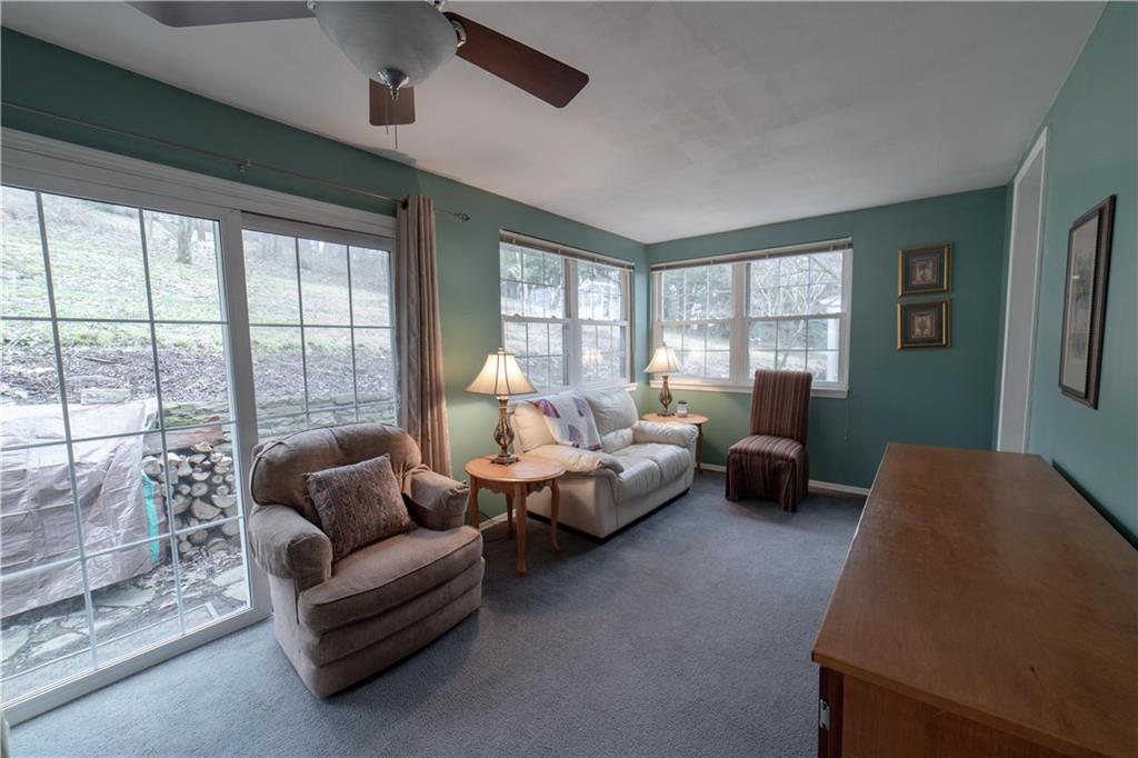327 Beadling Road Pittsburgh, PA 15228 - Photo 10 of 13 Light and bright family room. Space for conversation and home office.