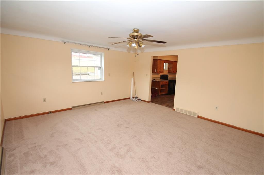 597 Armbrust - Hecla Road Hunker, PA 15639 - Photo 12 of 17 other side of living room into kitchen