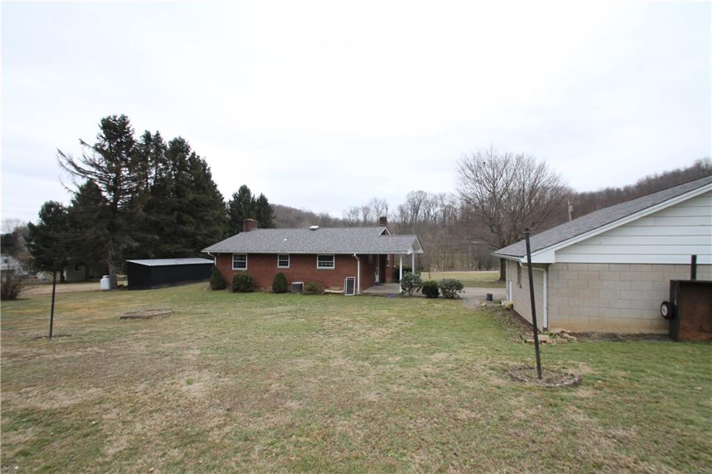 597 Armbrust - Hecla Road Hunker, PA 15639 - Photo 16 of 17 back of house and back of garage