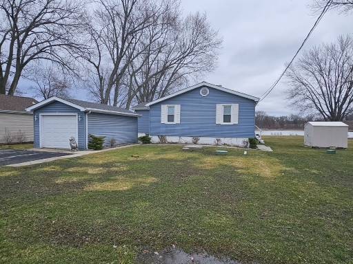 28227 West Fox River Road Cary, IL 60013 - Photo 1 of 13 a view of a house with a yard