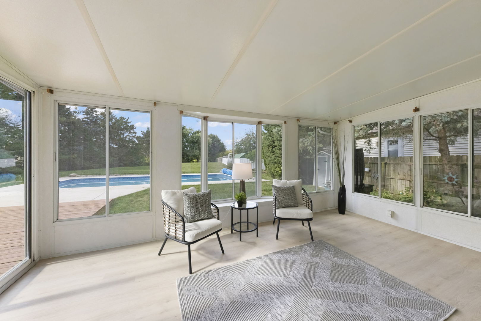 2235 Highfield Court Aurora, IL 60504 - Photo 13 of 31 a living room with furniture and large windows