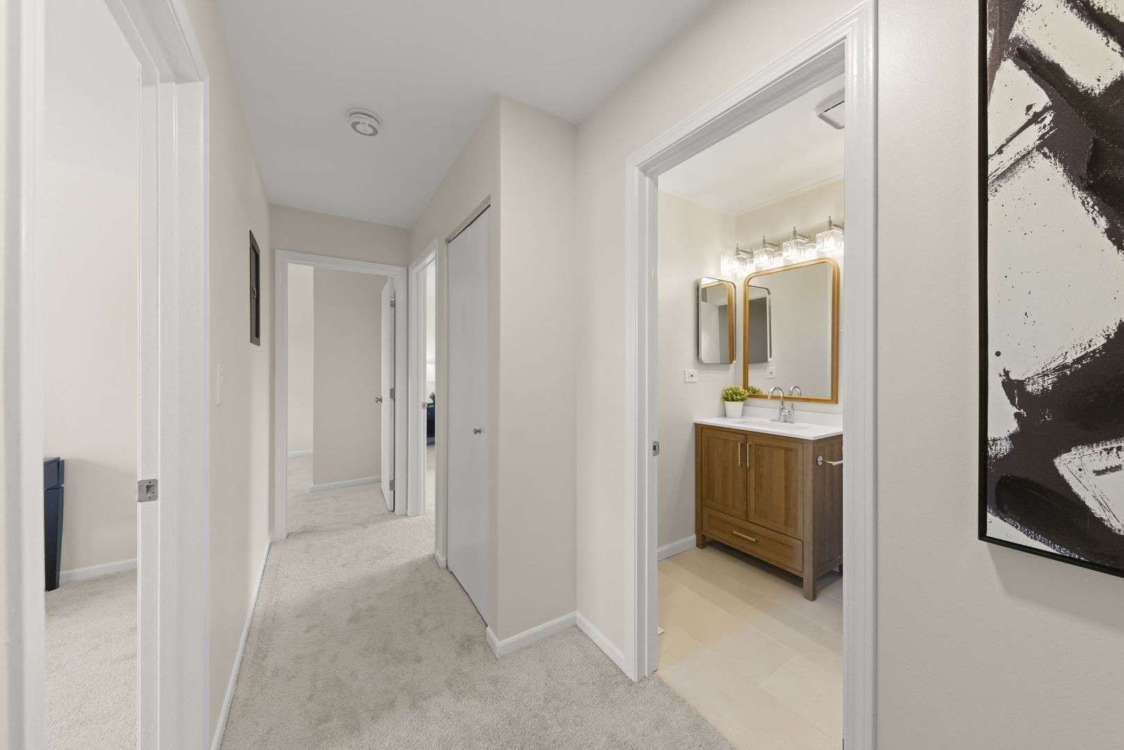 2235 Highfield Court Aurora, IL 60504 - Photo 21 of 31 a view of a bathroom from a hallway