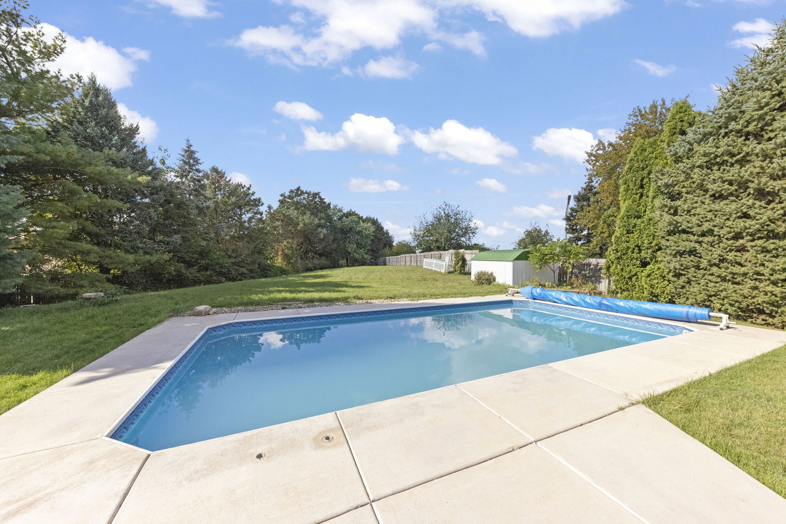 2235 Highfield Court Aurora, IL 60504 - Photo 24 of 31 a view of swimming pool with a yard