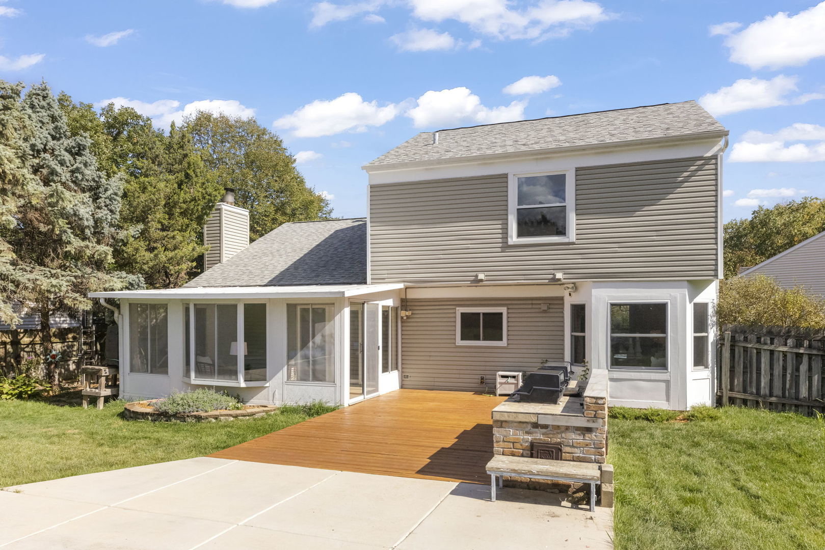 2235 Highfield Court Aurora, IL 60504 - Photo 25 of 31 a view of a house with backyard sitting area and garden