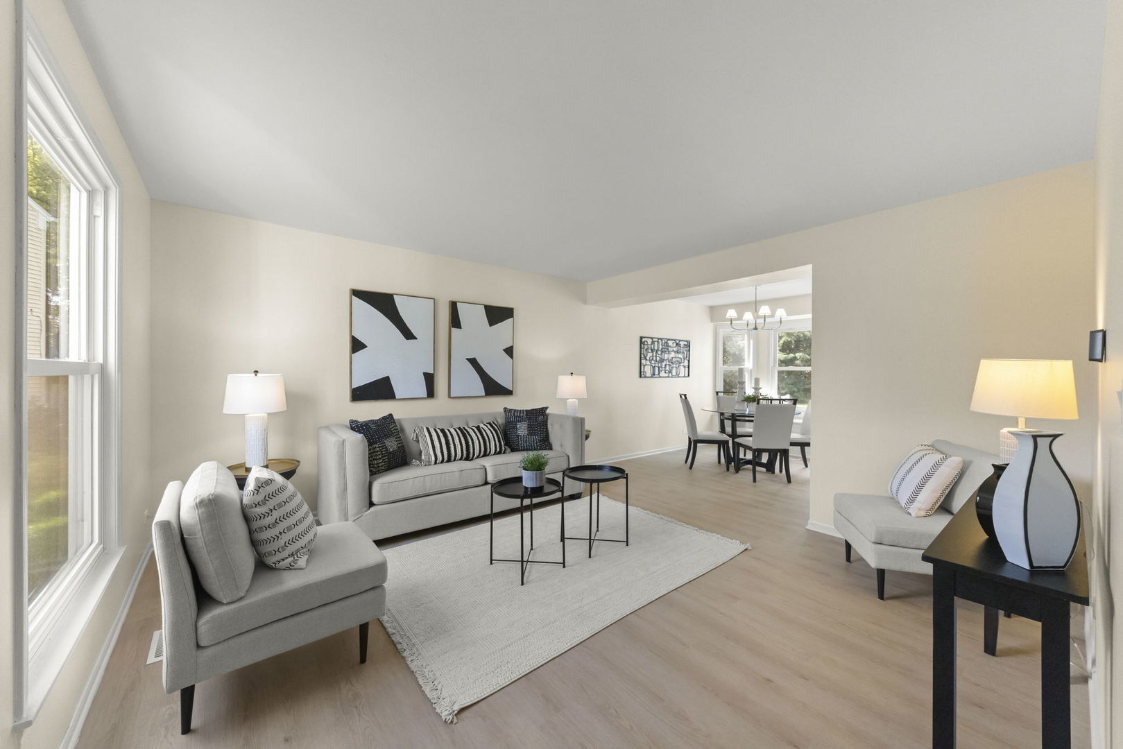 2235 Highfield Court Aurora, IL 60504 - Photo 4 of 31 a living room with furniture and a wooden floor