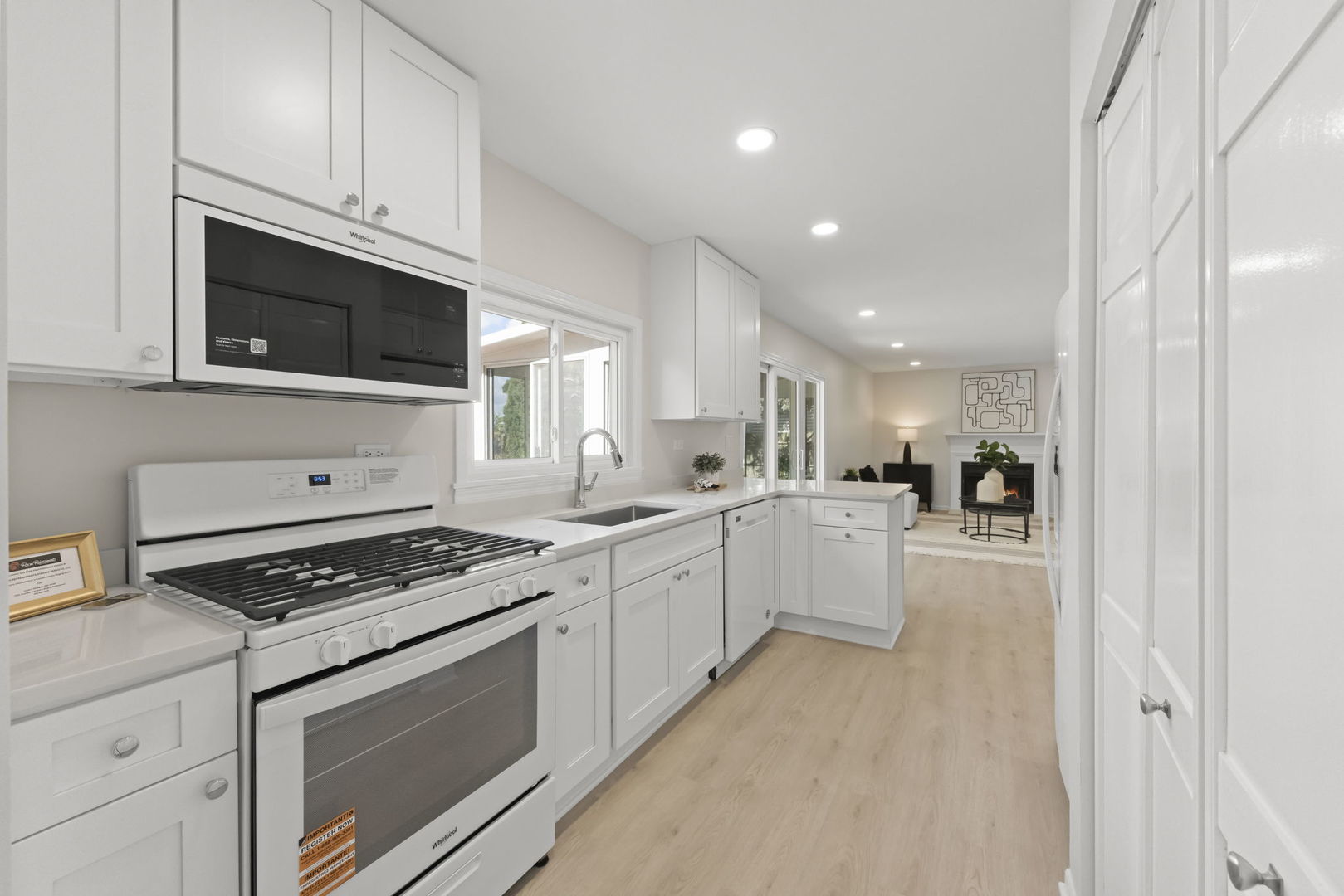 2235 Highfield Court Aurora, IL 60504 - Photo 9 of 31 a kitchen with stainless steel appliances white cabinets and stove top oven
