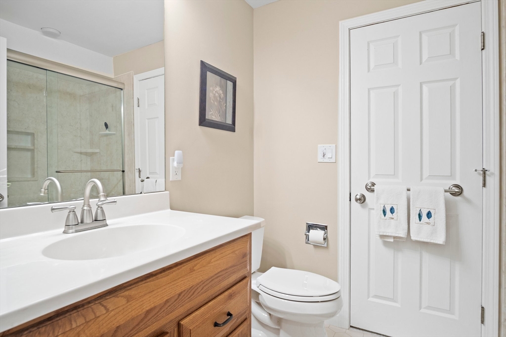 1 Abington Road, Unit 1 Danvers, MA 01923 - Photo 18 of 31 a bathroom with a sink toilet and shower
