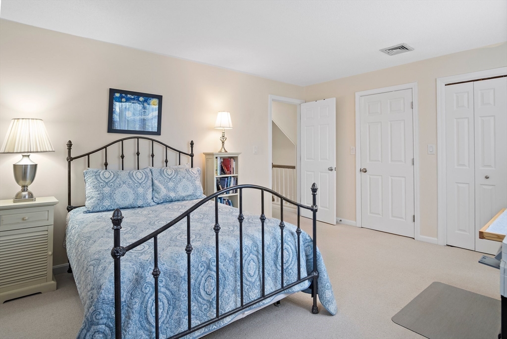 1 Abington Road, Unit 1 Danvers, MA 01923 - Photo 20 of 31 a view of staircase with railing and white walls