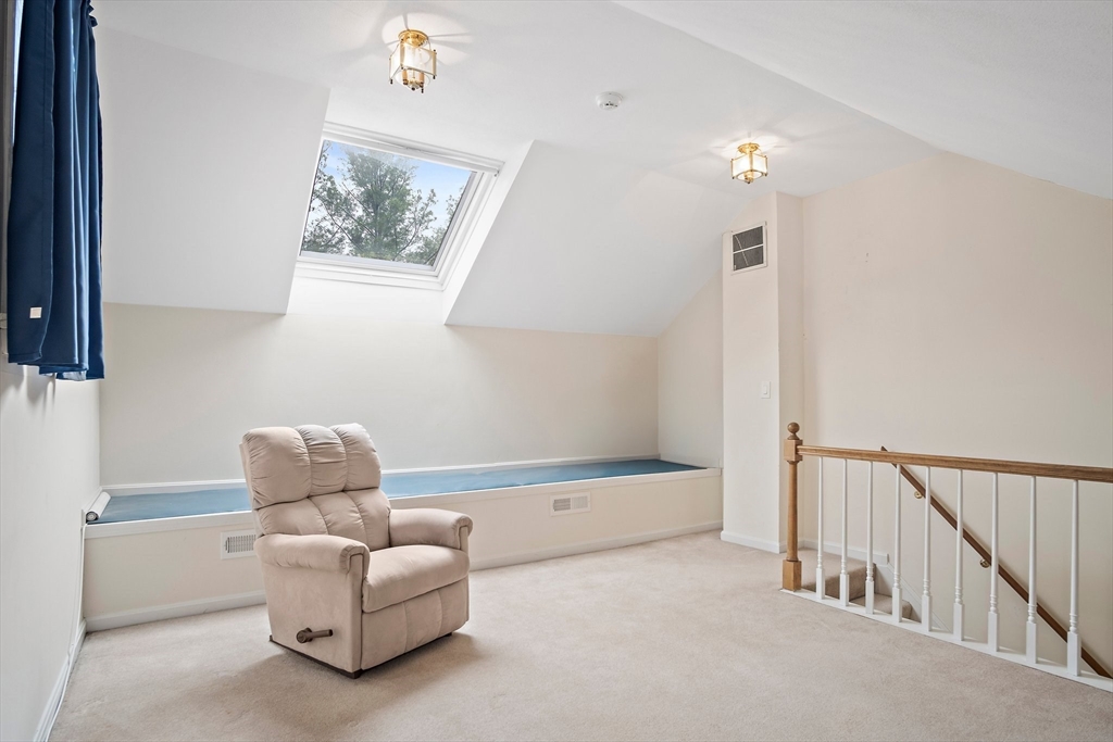 1 Abington Road, Unit 1 Danvers, MA 01923 - Photo 23 of 31 a bathroom with a bathtub and a window