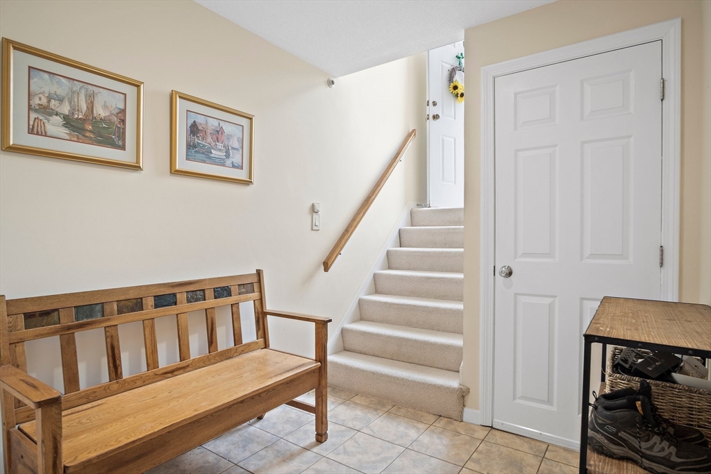1 Abington Road, Unit 1 Danvers, MA 01923 - Photo 24 of 31 a view of entryway with stairs and furniture