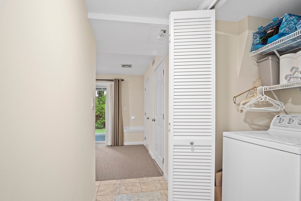 1 Abington Road, Unit 1 Danvers, MA 01923 - Photo 26 of 31 a utility room with dryer and washer