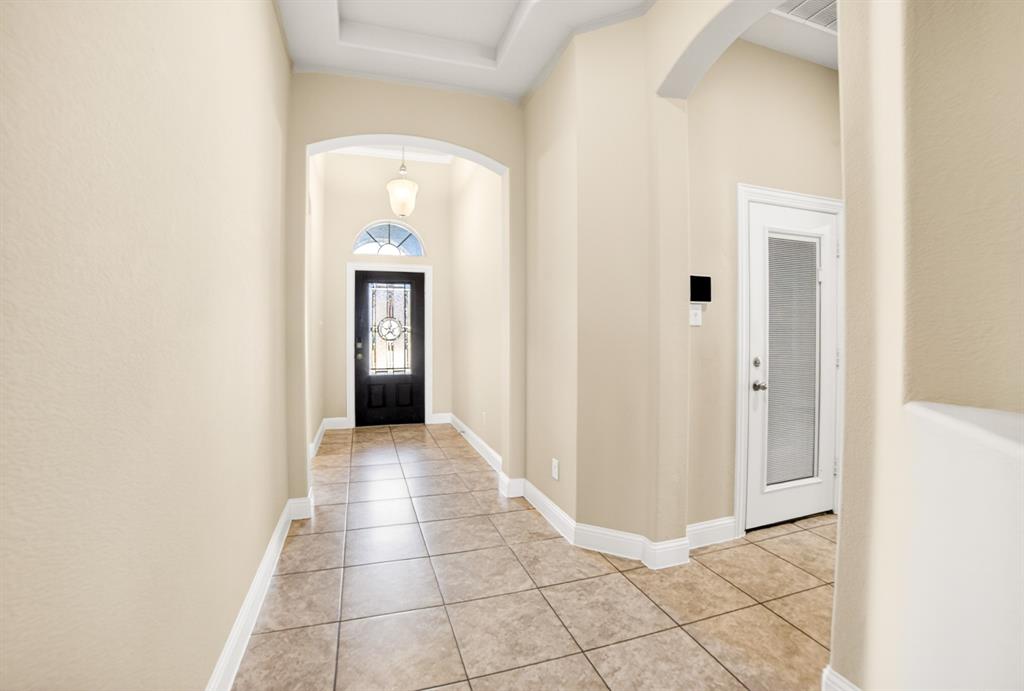 552 Winnetka Drive Oak Point, TX 75068 - Photo 5 of 40 a view of an entryway of a house