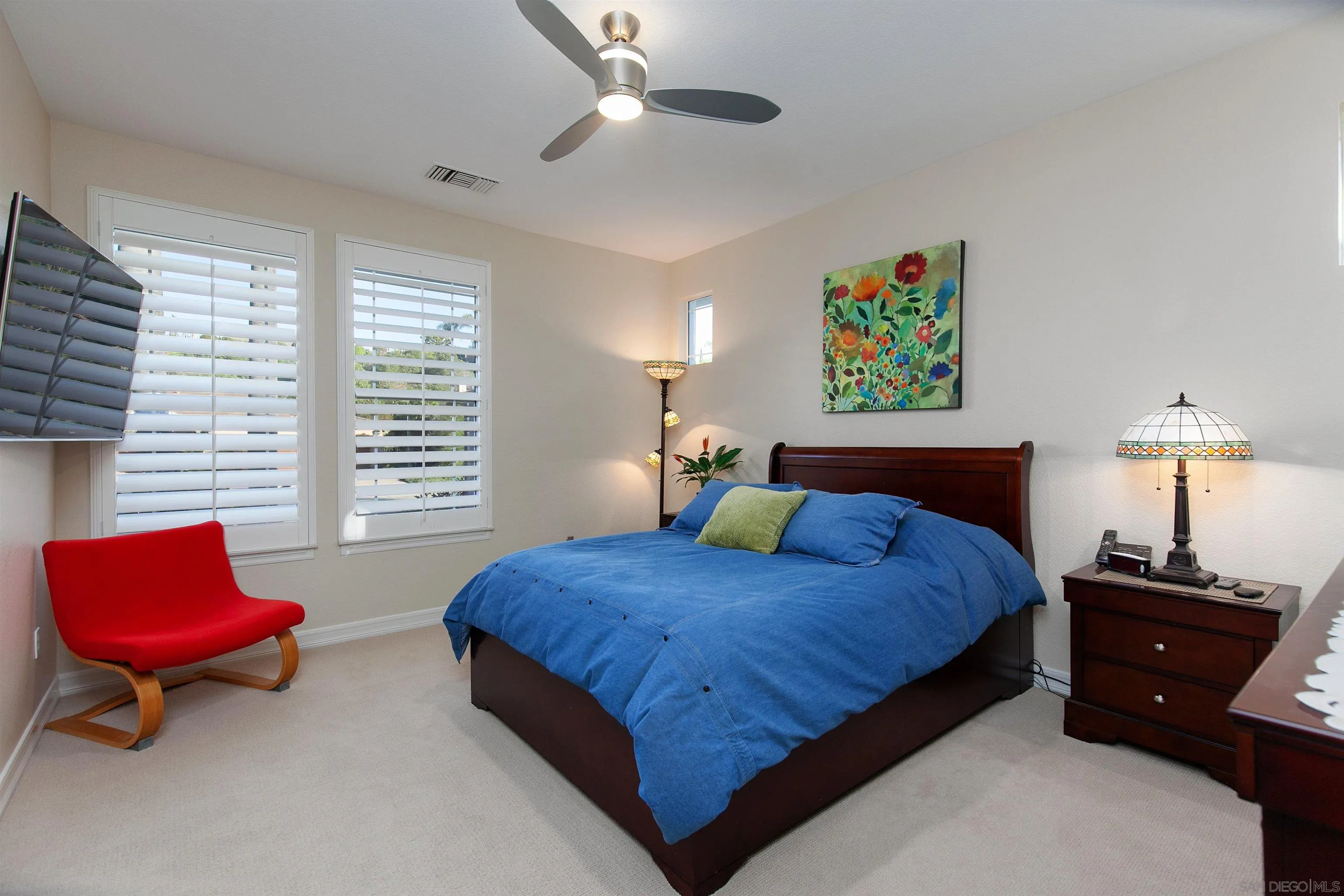 11760 Treadwell Drive Poway, CA 92064 - Photo 28 of 52 a bedroom with two beds and a chair