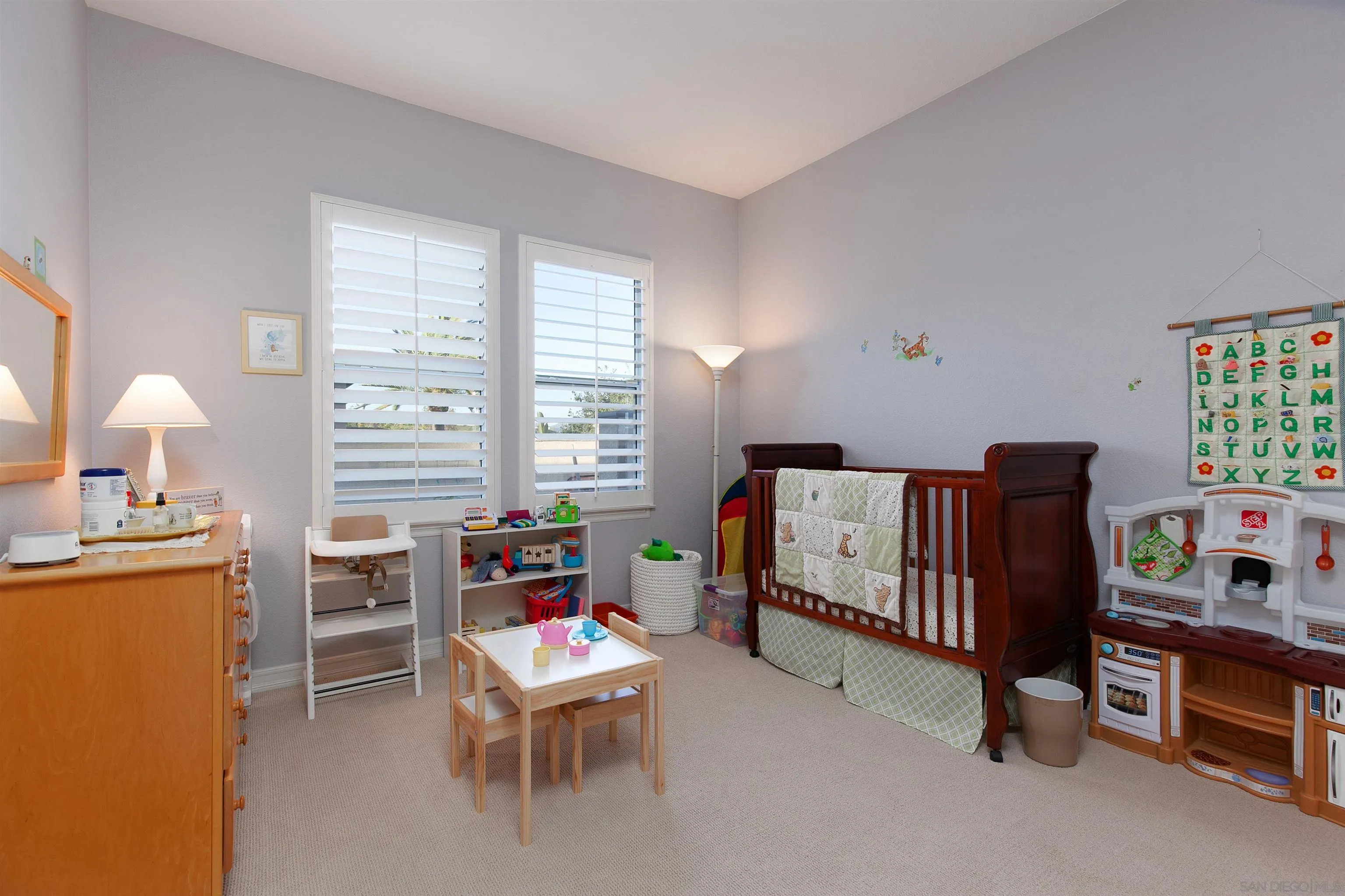 11760 Treadwell Drive Poway, CA 92064 - Photo 30 of 52 a bedroom with furniture and a window