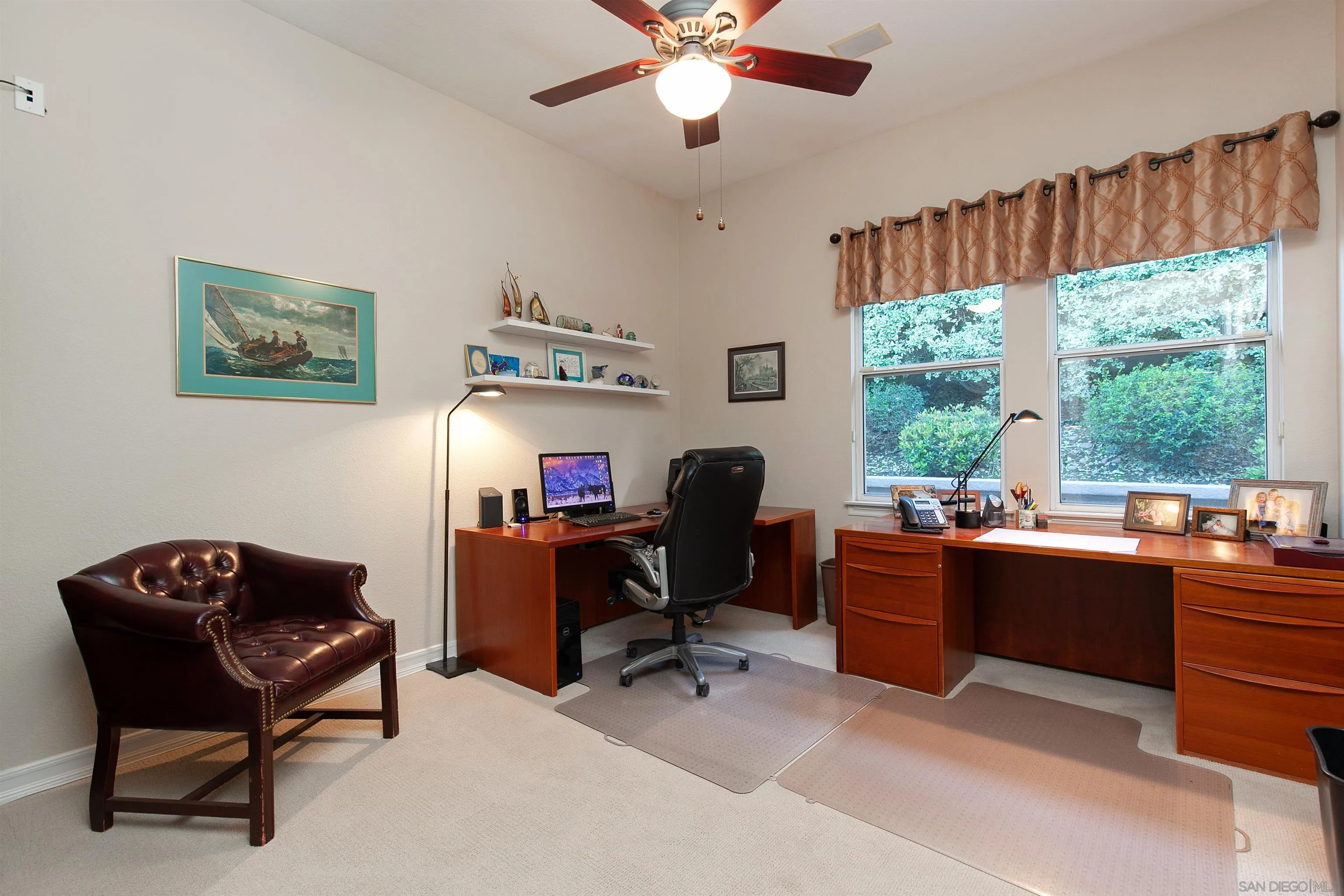 11760 Treadwell Drive Poway, CA 92064 - Photo 34 of 52 a view of a workspace with furniture and a window
