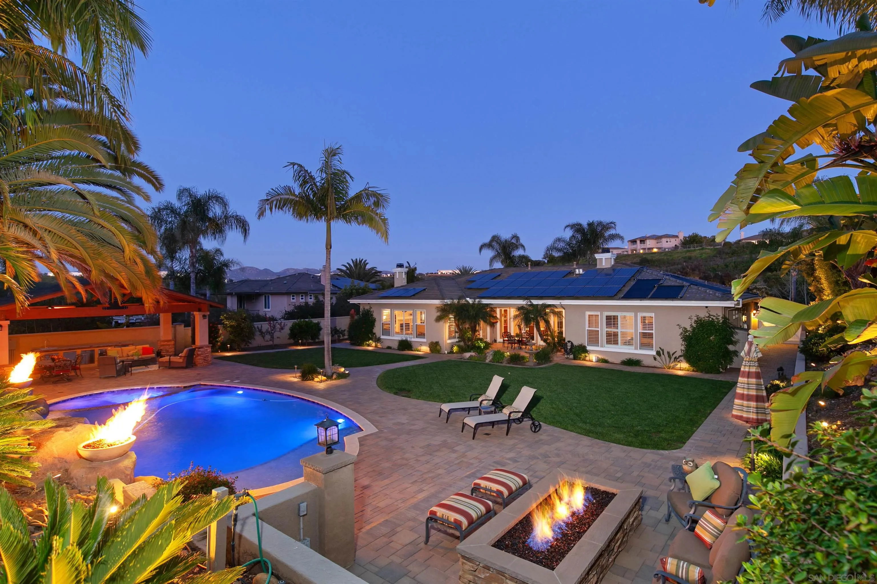 11760 Treadwell Drive Poway, CA 92064 - Photo 40 of 52 a view of a swimming pool with a patio and fire pit