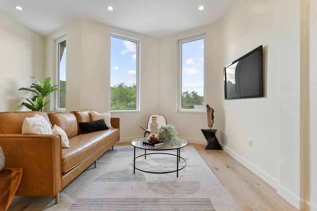 80 Terrace Street, Unit 302 Boston, MA 02120 - Photo 6 of 18 a living room with furniture